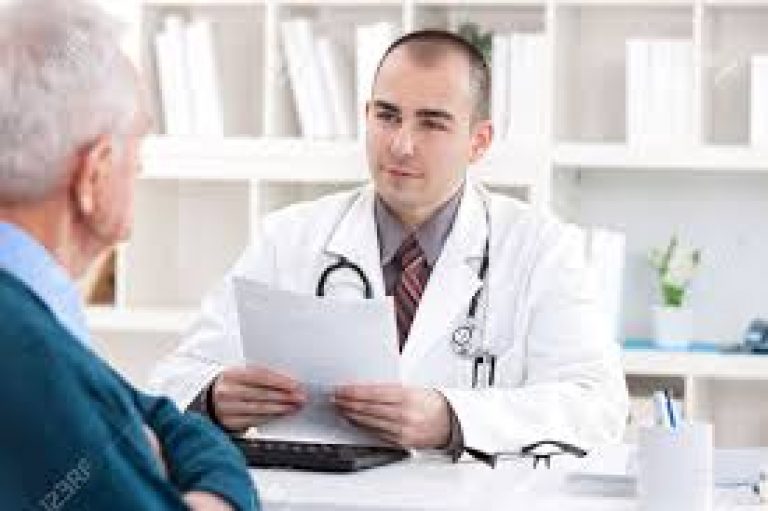 Doctor talking with senior about mesothelioma